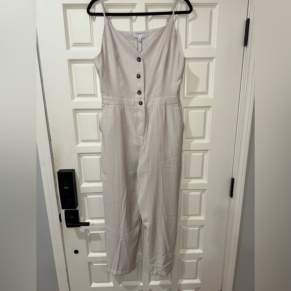 Cream Sleeveless Jumpsuit with Fitted Bodice